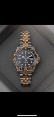 Rolex | GMT-Master II | 126713 | Steel | 40 mm | Gold/Steel | Black | Automatic