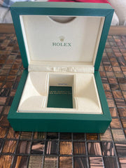 Rolex | Oyster Perpetual | 114300 | Steel | 39 mm | Steel | Red | Automatic