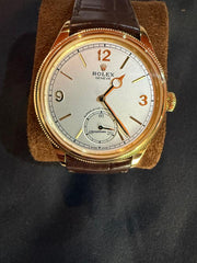 Rolex | 1908 | 52508 | Yellow gold | 39 mm | Crocodile skin | White | Automatic