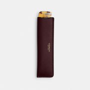 Coach Comb With Sleeve Brass Merlot