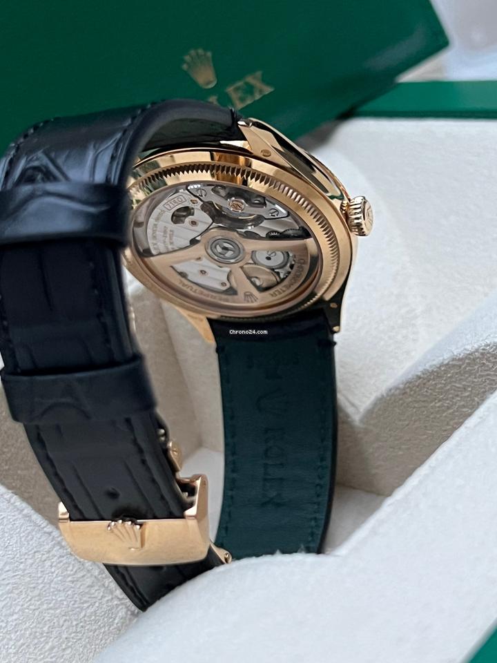 Rolex | 1908 | 52508 | Yellow gold | 39 mm | Crocodile skin | Black