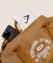 Women's Gymshark Strength Dept Mini Canvas Duffle Bag Antique Gold