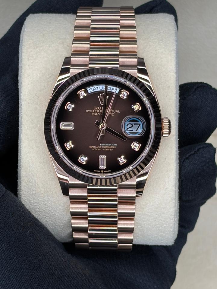 Rolex | Day-Date | 128235 | Rose gold | 36 x 43 mm | Rose gold | Brown | Automatic