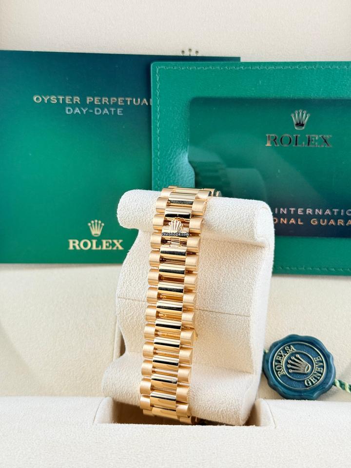 Rolex | Day-Date | 128348RBR | Yellow gold | 36 x 43 mm | Yellow gold | Green | Automatic