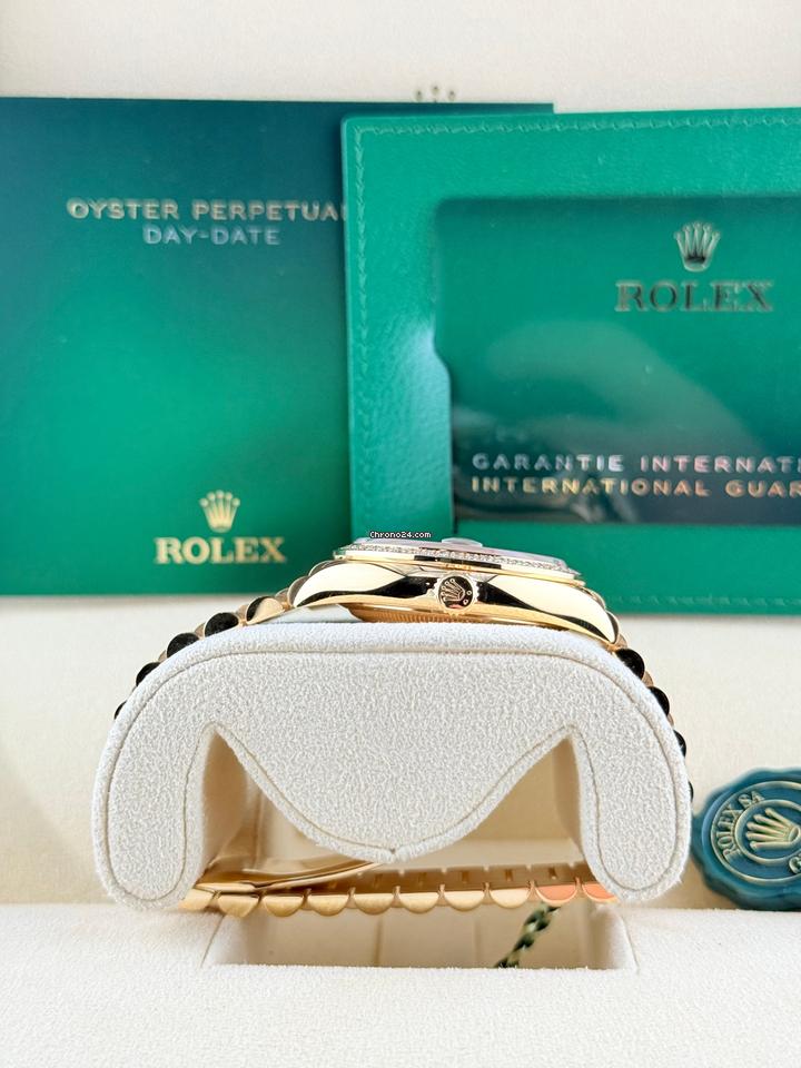 Rolex | Day-Date | 128348RBR | Yellow gold | 36 x 43 mm | Yellow gold | Green | Automatic