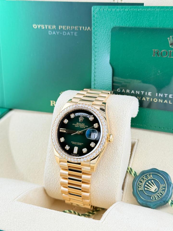 Rolex | Day-Date | 128348RBR | Yellow gold | 36 x 43 mm | Yellow gold | Green | Automatic