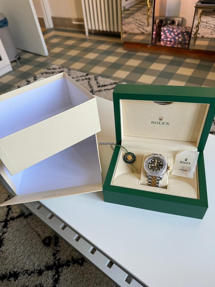 Rolex | GMT-Master II | 126713 | Steel | 40 mm | Gold/Steel | Black | Automatic