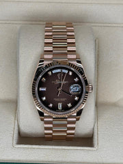 Rolex | Day-Date | 128235 | Rose gold | 36 x 43 mm | Rose gold | Brown | Automatic